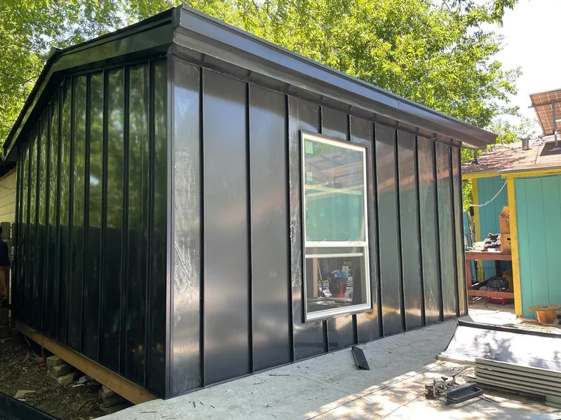 Black standing seam metal wall panels for Roof Inspection in Sauk Village